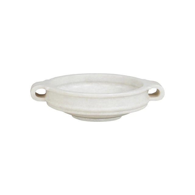 Meticulously carved from enduring marble, this circular bowl is a sophisticated accent piece for any interior. 16" x 12¾"...