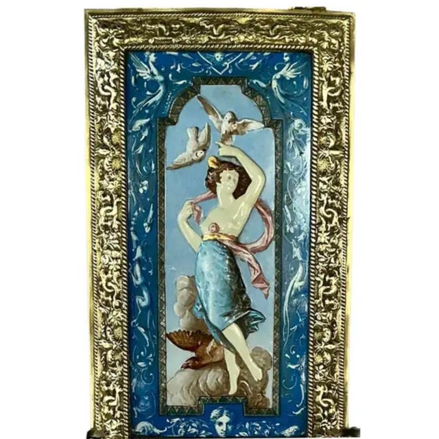 19th Century French Ceramic and Brass Wall Sconce with Three-Arm Decorative Candle Holder. Sconce features a finely cast...