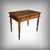 Discover the authentic charm of this small solid walnut writing desk from the 1920s. with its classic lines and warm-toned...