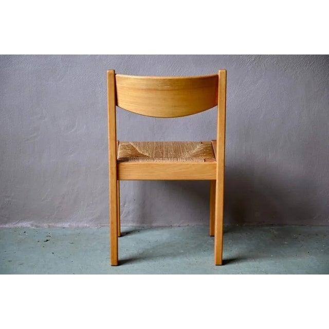 Elegant and understated, this 1970s chair is bright and very comfortable. The minimalist design features clean lines and a...