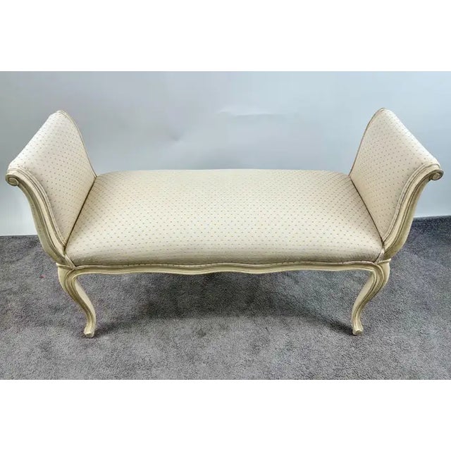 20th C French Louis XV Style Off-White & Beige Upholstered Bench or Window Seat Exuding timeless elegance, this 20th...