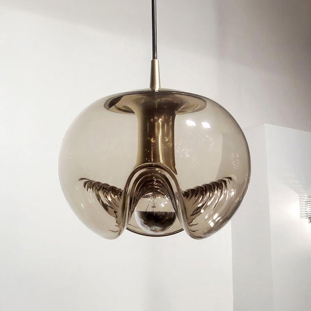 Timeless smoked glass pendant light ‘Futura’ by Peill & Putzler, Germany, wave pattern on the underside of an 10.0″ globe,...