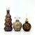 Neutral perfume bottle curation, group of 3. A gorgeous set of mottled earth-toned brown glass perfume bottles with...
