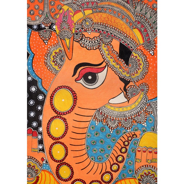 This vibrant, hand-painted Madhubani folk art painting by Mamta Devi, a 2016 National Award winner, depicts Lord Ganesha...