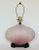 This is a vintage molded glass table lamp with an applied matte finish in shades of pink. It was a black, Asian style base...