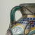 Large Moroccan vase handcrafted in terracotta in classic form hand decorated on floral designs in distinctive...