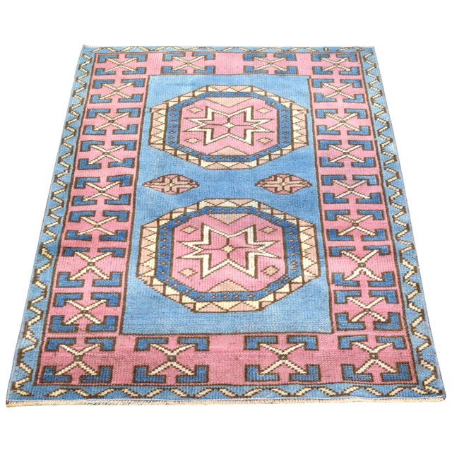 Hand-knotted with care using traditional rug making techniques, this wool rug blends timeless craftsmanship with a modern...