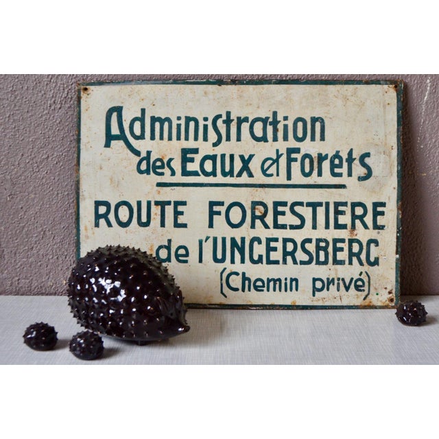 An invitation to take a stroll, this old metal sign once announced the Ungersberg Forest Road. Its beautiful hand-drawn...