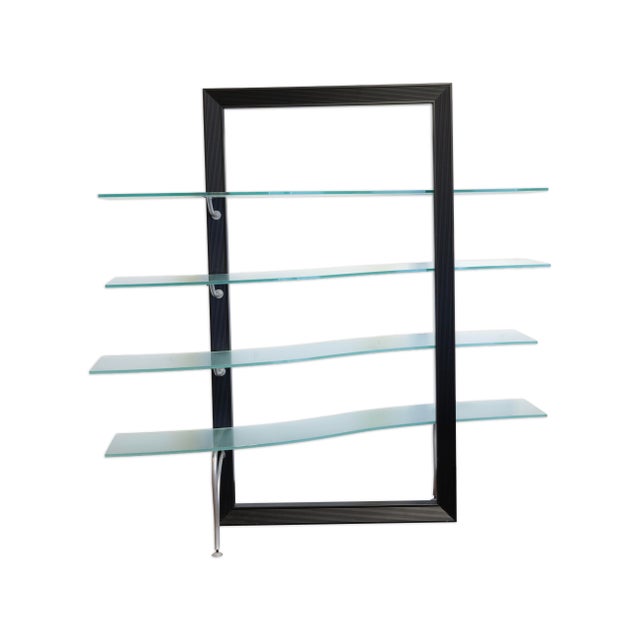 This Cattelan Italia Flexa bookshelf is a striking example of Italian postmodern design, combining sculptural form with...