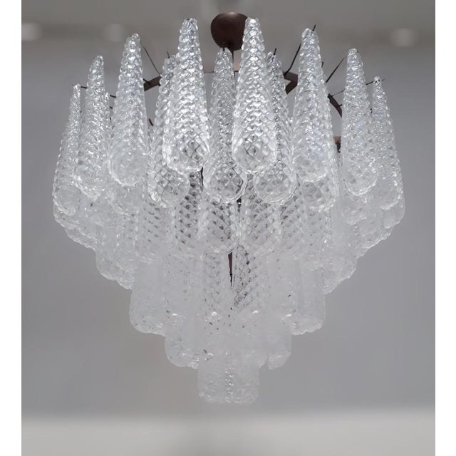 Italian chandelier shown with hand blown Murano etched tears glass drops, mounted on bronzed metal finish frame by Fabio...
