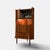 Vintage danish corner bar cabinet executed in richly figured rosewood and produced in denmark during the 1960s. the...