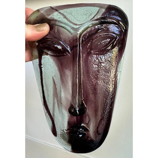 Vintage circa 1960s hand-forged glass face mask sculpture. Perfect to lay flat on a book, coffee table or can be hung...