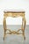 Offered by ByThijs is this antique French side table/center table from the 19th century with a gold-colored wooden frame...