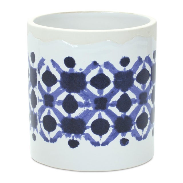 Elevate your plant styling game with this chic set of Tie-Dye Ceramic Pots. Designed with a modern blue and white swirl,...