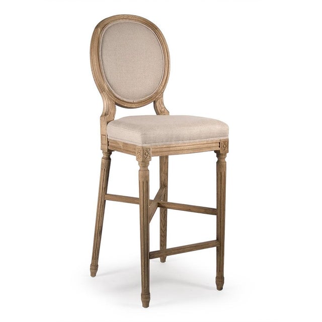 The Medallion Bar Stool from Zentique brings the iconic Louis XVI oval-back (medallion) silhouette to bar height at 30"....