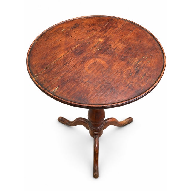 The round, stationary top features a hand-planed underside. It rests on a ring-turned pedestal column with a classic...