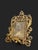 Superb rectangular gilt bronze frame mounted on two cabriole legs with a rear support. The front is richly chased with...