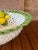 A beautifully handcrafted Italian ceramic centerpiece bowl by Lanzarin Ceramiche, featuring an intricately woven basket...