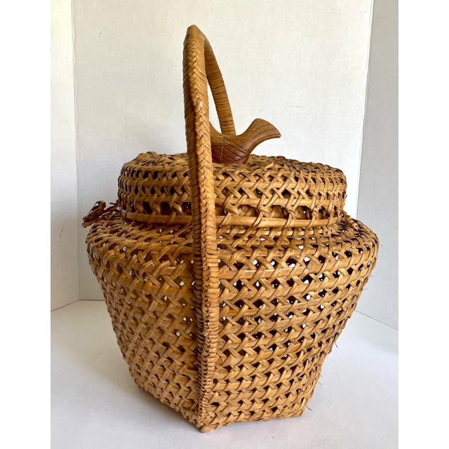 Vintage Woven Wicker Rattan Lidded Basket With Carved Wood Bird For Sale - Image 11 of 13