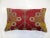 Pillow made from a vintage turkish rug with cotton back. Zipper closure and foam insert provided. 16'' x 27''