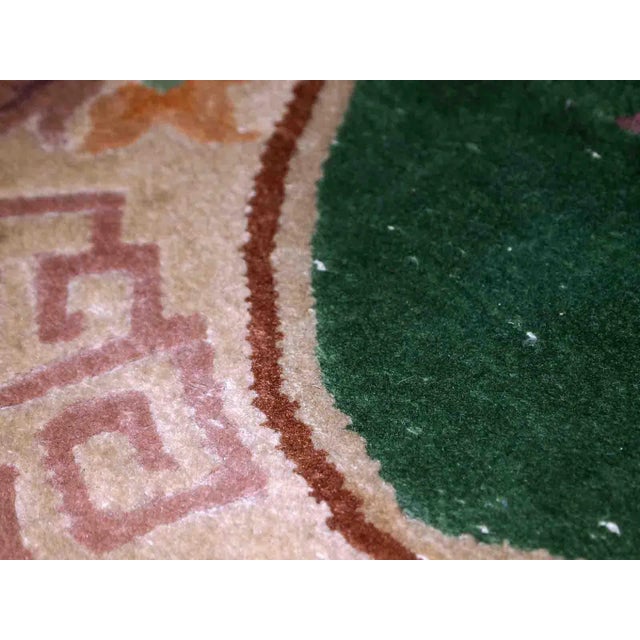 Handmade antique Art Deco Chinese rug in deep green colour. It is in original good condition, has been made in the...