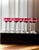 A set of eleven vintage cordial or liqueur glasses in ruby cut-to-clear crystal, attributed to Val Saint Lambert. The...