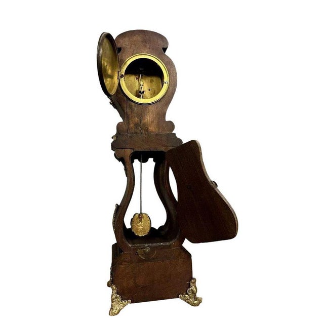 Rare Maitrise clock featuring a parquet regulator in wood and gilded bronzes circa 1880, violin-shaped case, dial signed...