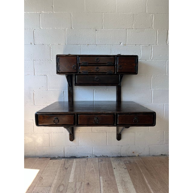 Rare opportunity. Peter Asher floating desk and cabinet, dating to the 1960s and exemplifying the designer’s distinctive...