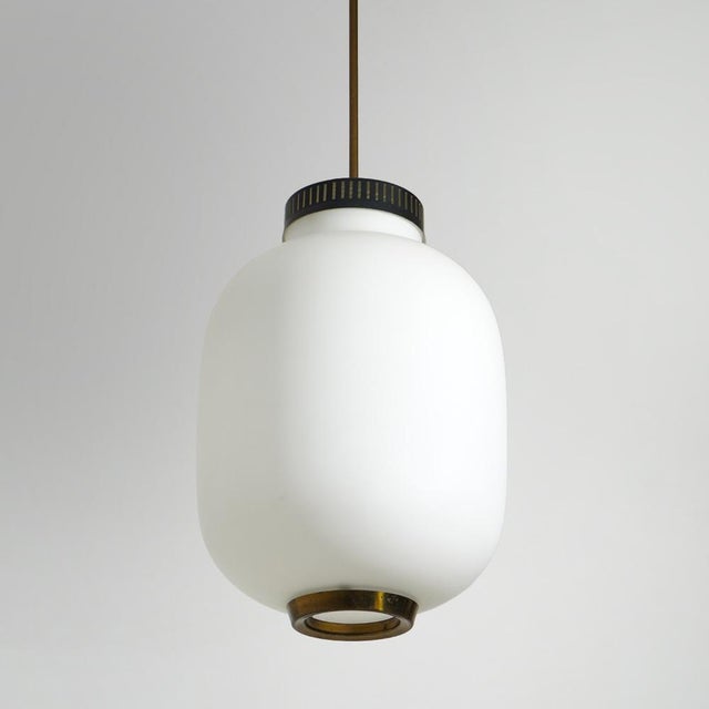 A 1950s pendant lamp that interprets light through a carefully balanced relationship between material and proportion. The...