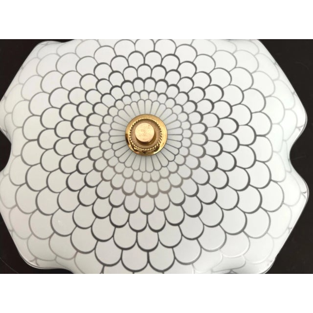 Petite mid century frosted matte glass flush mount ceiling light in the shape of a flower blossom with graduating...
