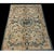 Antique Ningxia Small Scatter Size Wool Beige Rug, Circa Date: 1880s. This exquisite example of late 19th-century Chinese...