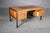 Stunning rosewood desk made by Farsø Stolefabrik For Maurice Villency. Deep wood grain throughout with accenting metal...