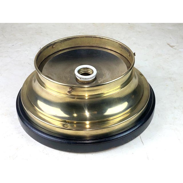 This beautiful piece is made of Wood, Brass and Glass The brass has been repolished. The light was completely...