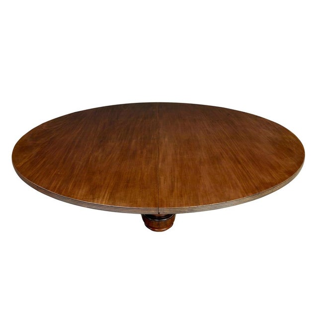 Mid 19th century victorian dining table of grand proportions circa 1860. We are pleased to offer this near circular dining...