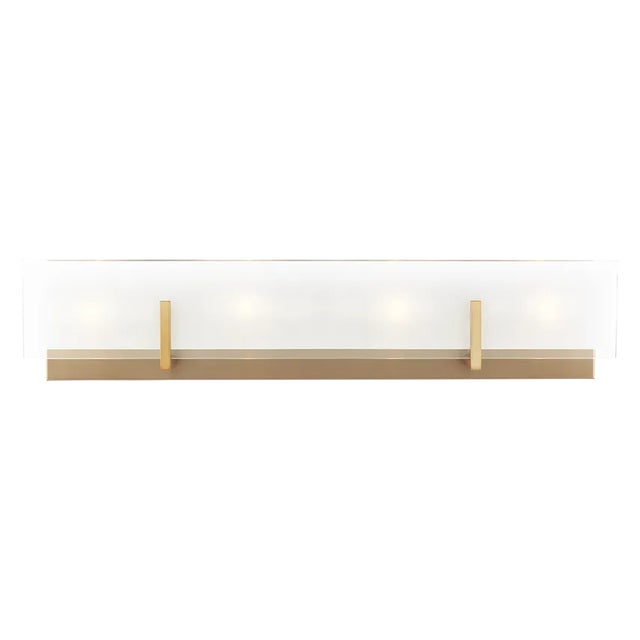 The Syll four light vanity fixture in satin brass offers shadow-free lighting in your powder room, spa, or master bath...