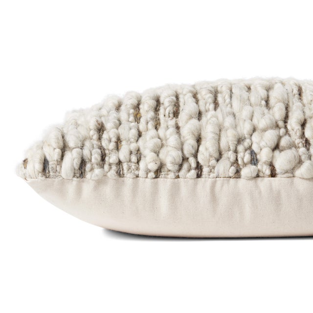 Throw pillows by Amber Lewis x Loloi take inspiration from heirloom textiles and earth-toned palettes to create an...