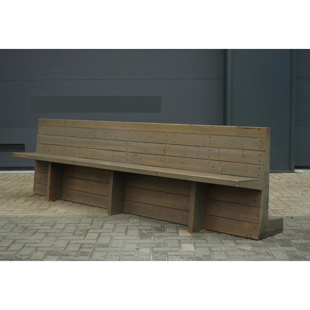 A rare long bench designed by Dom Hans van der Laan and executed by Jan de Jong for the Sint-Willibroduskerk in Almelo....