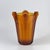 Striking Art Deco glass vase produced in Bohemia during the 1920–1930s. Made of thick amber-colored glass with a strong...
