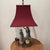 The Chinoiserie Porcelain Figural Table Lamp on Brass Base in Famille Rose Palette is a luxurious and decorative lighting...
