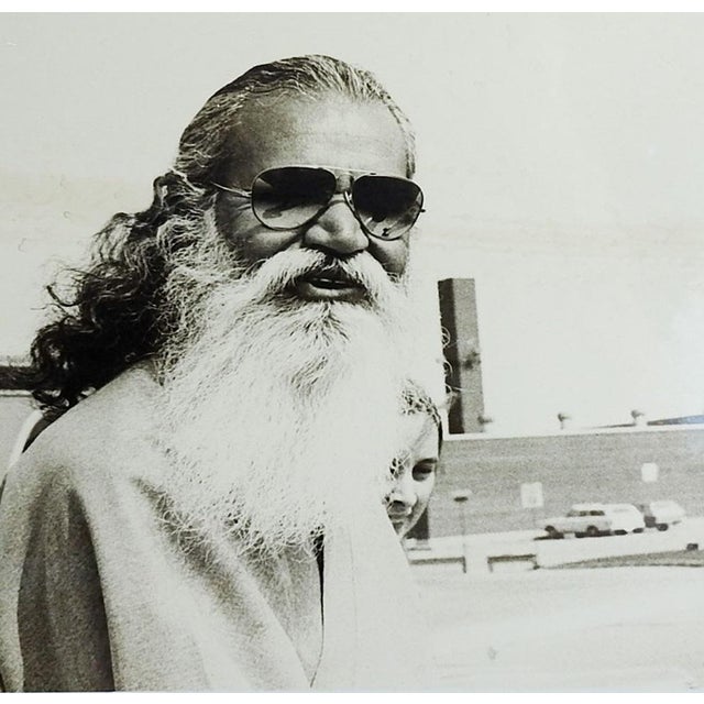 Mid 20th century silver gelatin photograph of yogi wearing sunglasses. Unsigned. Unframed, 8" x 10" photo mounted on old...