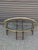 Oval brass tray over a tortoise-lacquered faux bamboo base in the unmistakable Baker idiom. The oval is the scarcer form...
