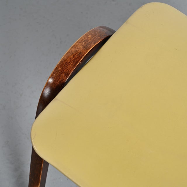 These stackable stools, model 202, created by Isamu Kenmochi, a key figure in postwar Japanese design, perfectly reflect...