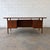 A large Danish teak executive desk by Kai Kristiansen for Feldballes Møbelfabrik, dating to circa the 1960s. The expansive...