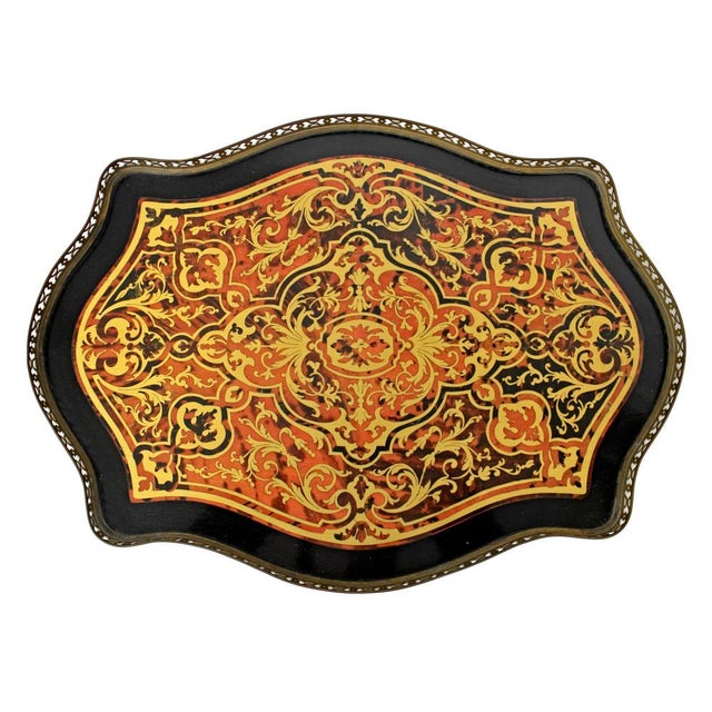 Napoleon III style coffee table, made in Italy in the 1970s. Table top inlaid with brass, complete with bronze railing. It...