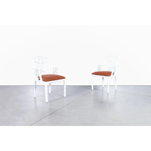 Vintage Hollywood Regency lacquered armchairs manufactured in the United States during the 1950s. Beautifully restored...