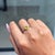 This elegant ring showcases a 0.85 carat natural oval yellow sapphire, set in 14k white gold. The center stone measuring...