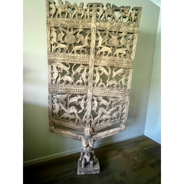 This exceptional architectural screen strongly aligns with the prestigious woodcarving traditions of West Africa,...