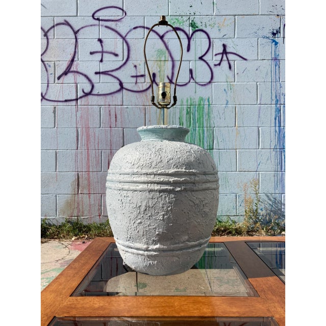 Vintage white washed teal blue plaster ginger jar lamp by S & M Industries, circa 1978. Piece dimensions: Lamp stands 25”...
