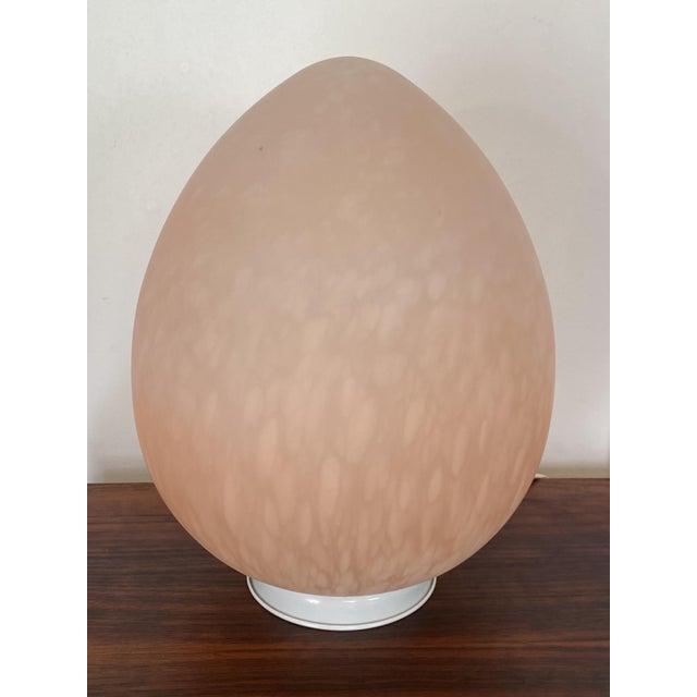 Beautiful lamp in excellent condition Mottled pink color Provides a lovely, soft light, made in Italy in the 1970s Glass...