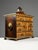 Small art cabinet with architectural marquetry, 18th century. Small table cabinet veneered with mahogany, with nine...